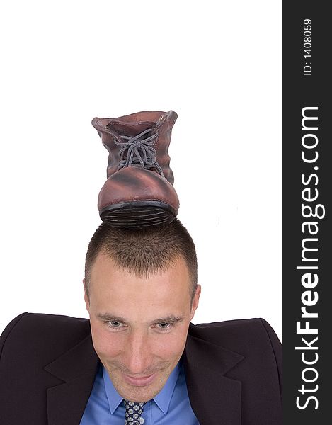 Young business man with a foot on head