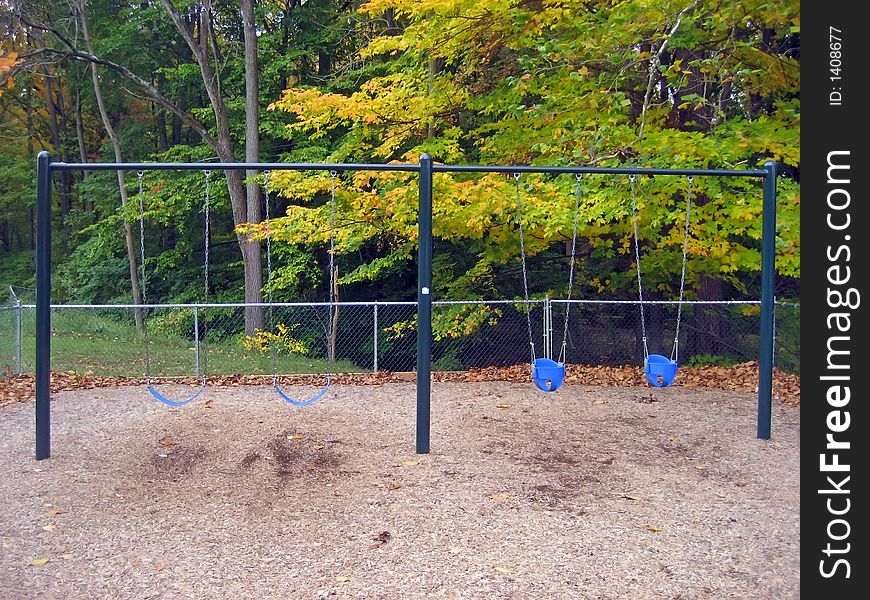 Swingset in a Park in the Autumn. Swingset in a Park in the Autumn