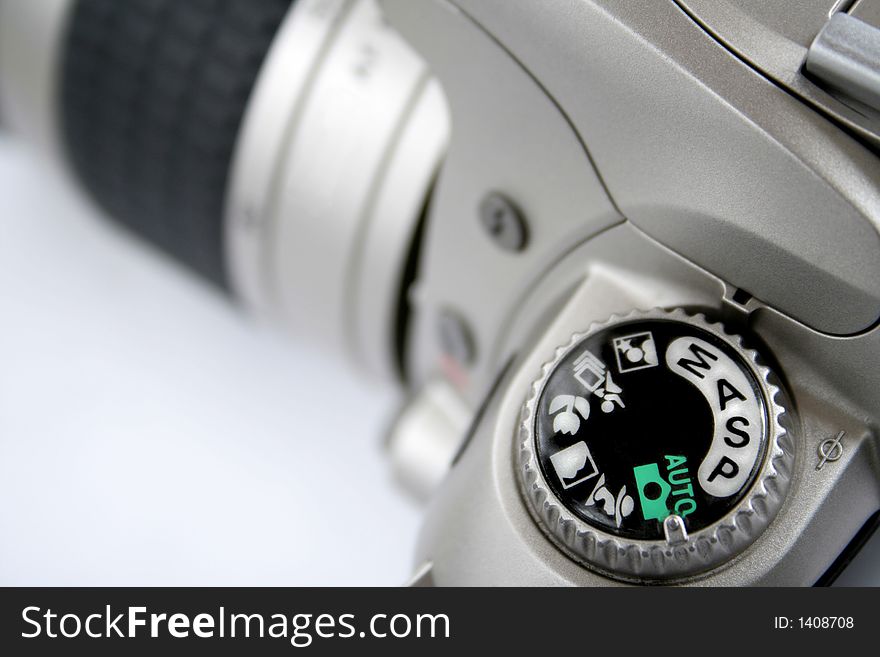 SLR photographic camera isolated over white background. SLR photographic camera isolated over white background