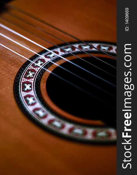 Close-up of classical guitar strings, very shallow DOF. Close-up of classical guitar strings, very shallow DOF.