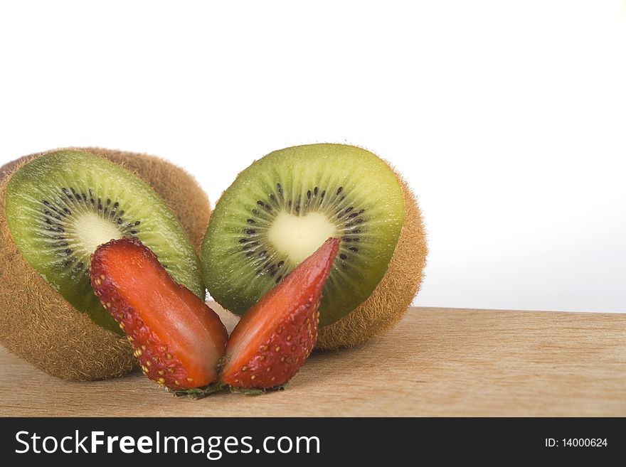 Kiwi and fresh strawberry isolated on white background