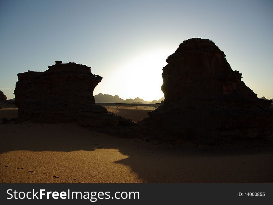 Rocks in the sunset in the desert of Libya, in Africa. Rocks in the sunset in the desert of Libya, in Africa