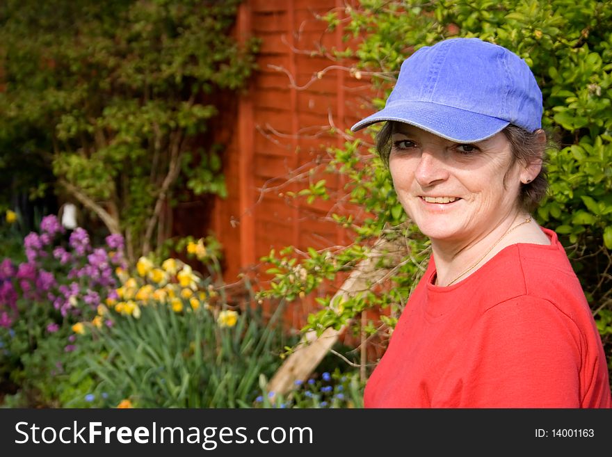 Smiling Mature Woman In Garden