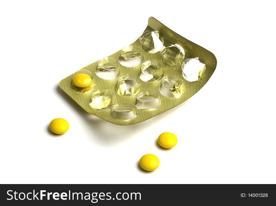 Package of Yellow Pills isolated on white