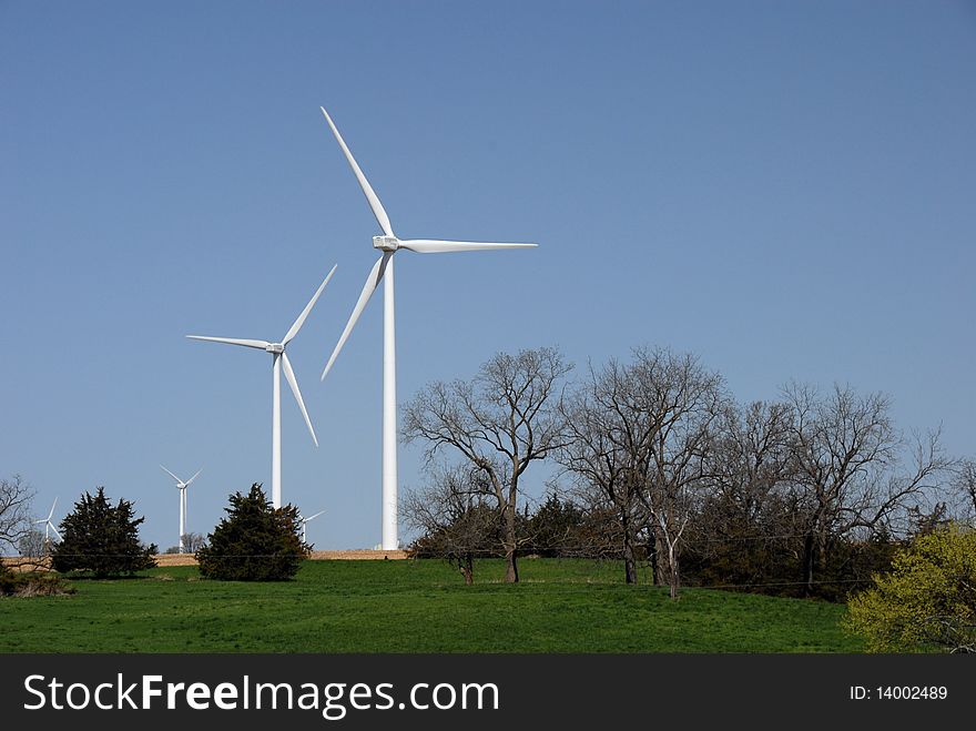 Wind powered generators above the trees