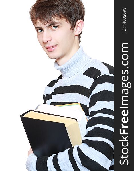 Young guy with books in hands on white background. Young guy with books in hands on white background.