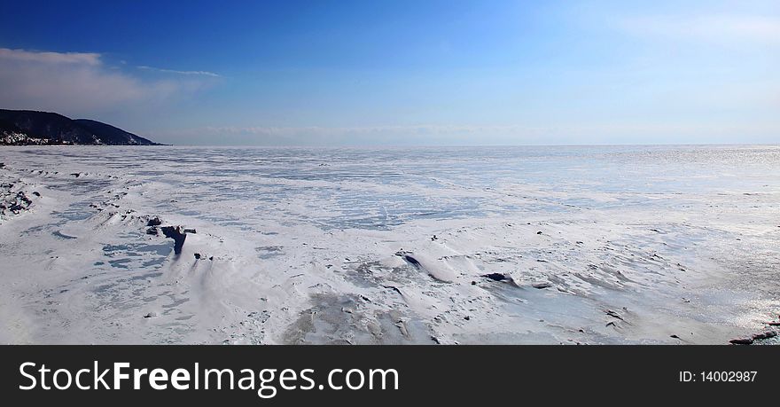Frozen Lake Baikal. Spring. Day.
