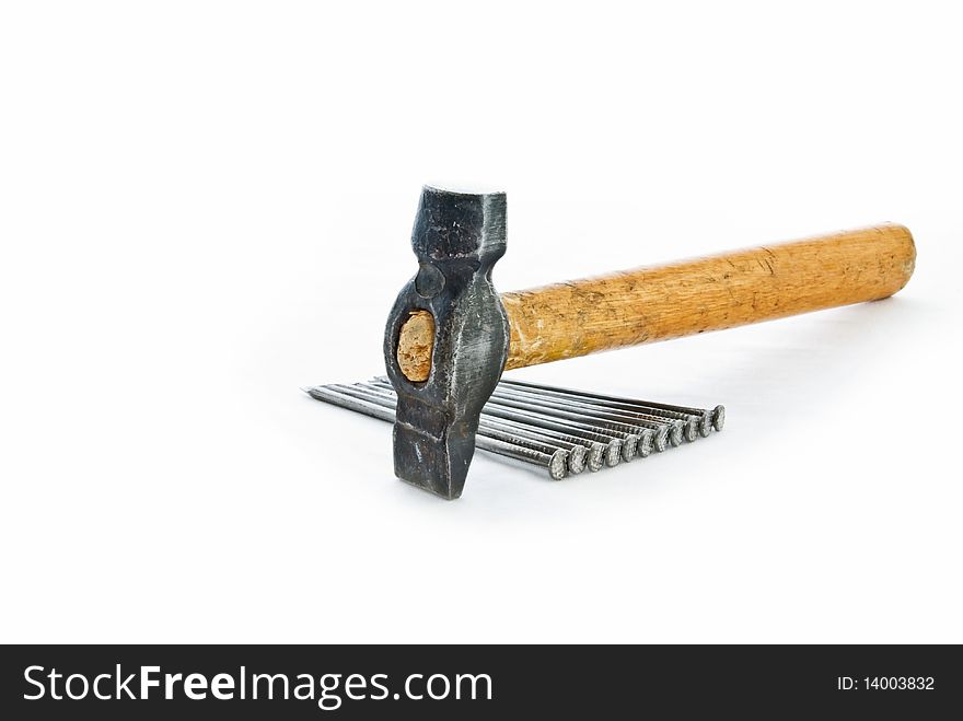 Hammer and nails on a white background