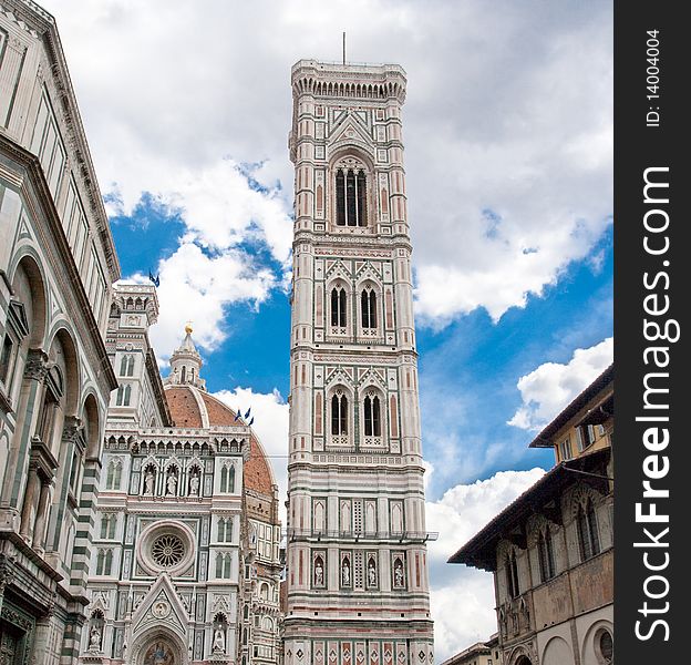 Italian tower over blue sky