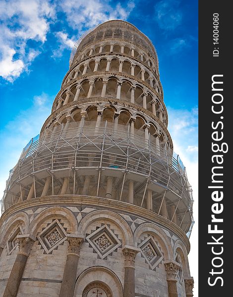 Famous Pisa tower over blue sky