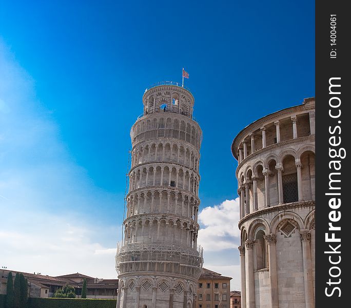 Famous Pisa tower over blue sky