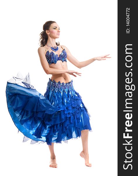 Beautiful woman dancing in blue dress
