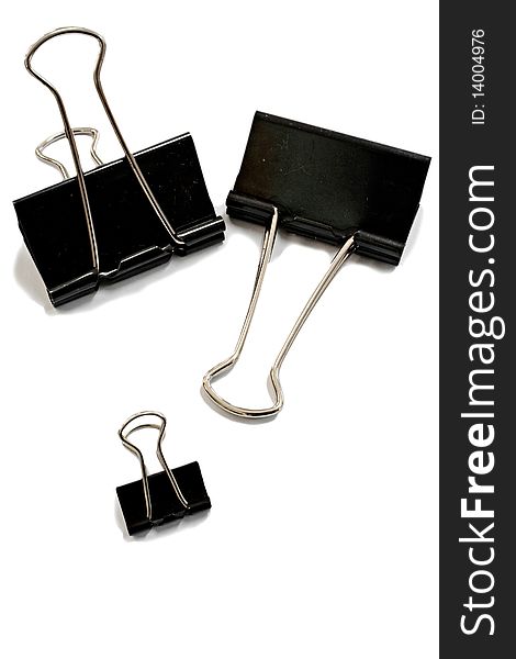 Black paper clips isolated on a white background