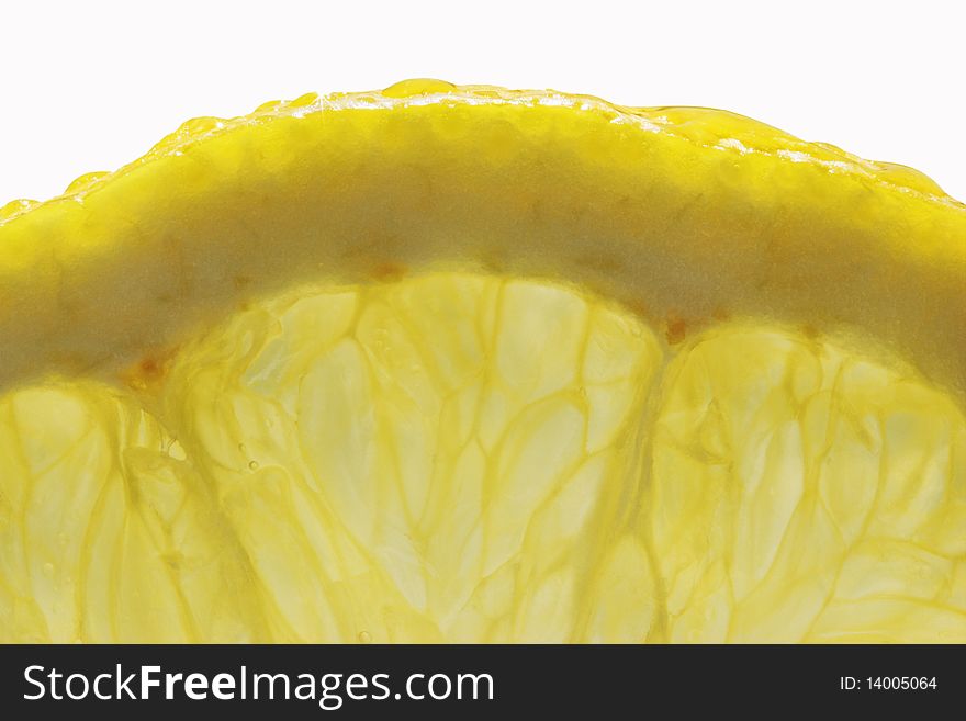 Slice of fresh juicy lemon close up. Slice of fresh juicy lemon close up