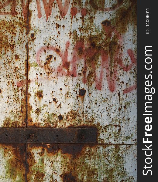 Old rusty texture on a metal door