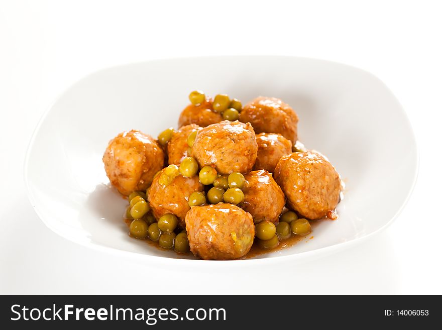 Meatballs with green peas