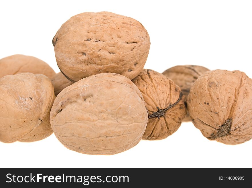 Handful of walnuts on a white background. Handful of walnuts on a white background