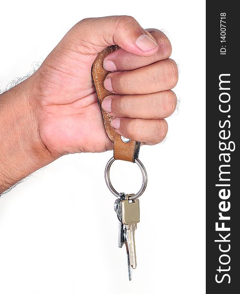 Human hand with keys on white background