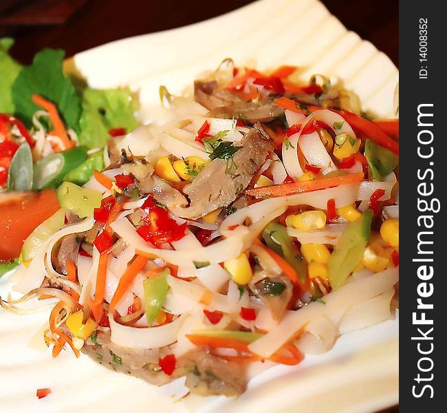 Very spicy duck salad served with vegetable and fruit. Very spicy duck salad served with vegetable and fruit