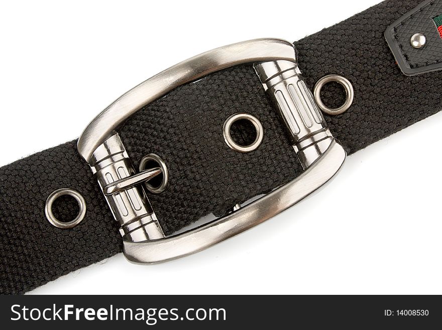 Metal buckle and black textile belt isolated on white. Metal buckle and black textile belt isolated on white