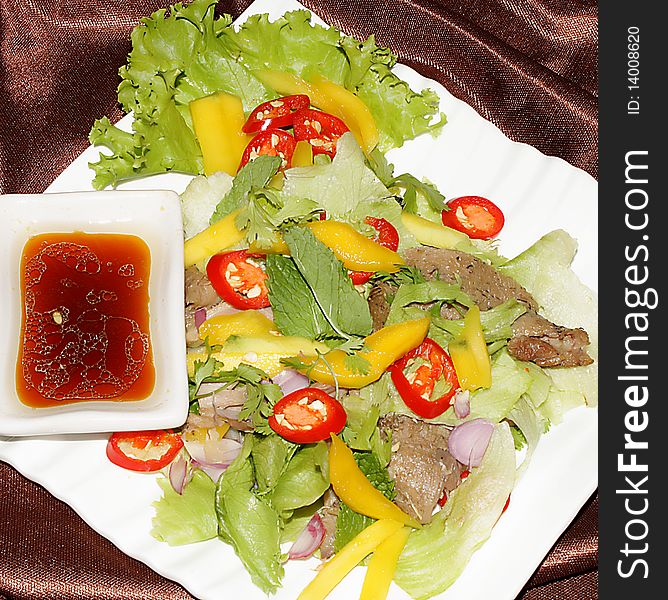 Very nice duck salad served with vegetable and hot spicy sauce. Very nice duck salad served with vegetable and hot spicy sauce