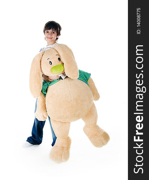 Cute little boy with a big rabbit on white background