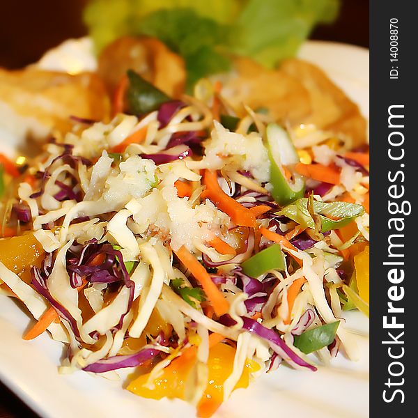 Very healthy salad served with traditional sauce mix with hot and spicy sauce