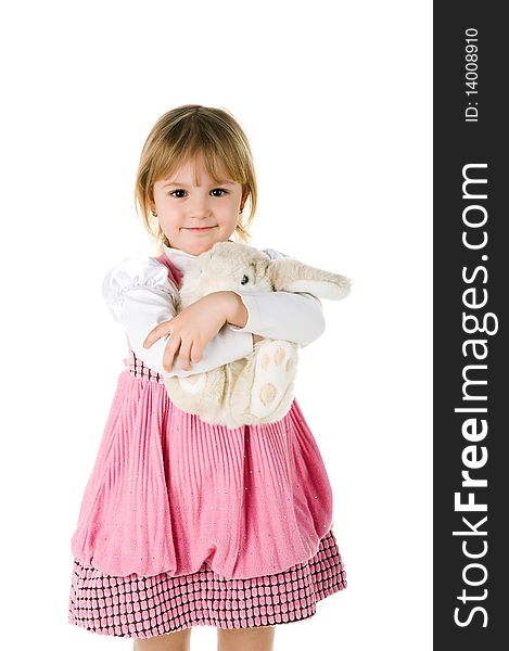 Little girl with her hare toy on white background