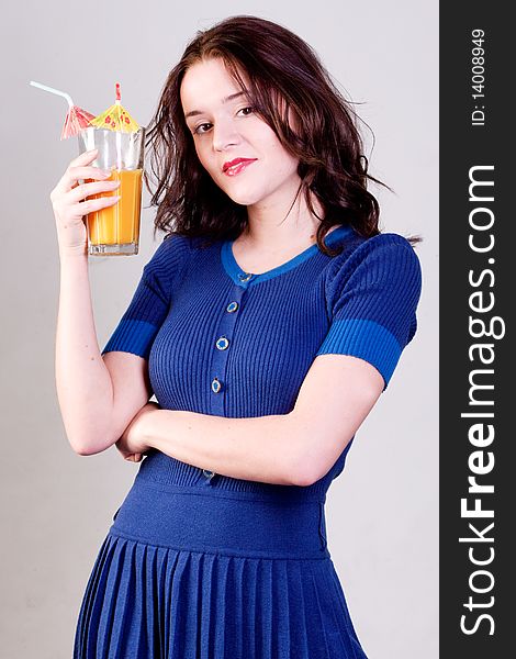 Beauty Young Woman With Orange Cocktail