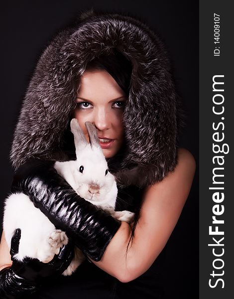 Image of stylish girl with her rabbit. Image of stylish girl with her rabbit