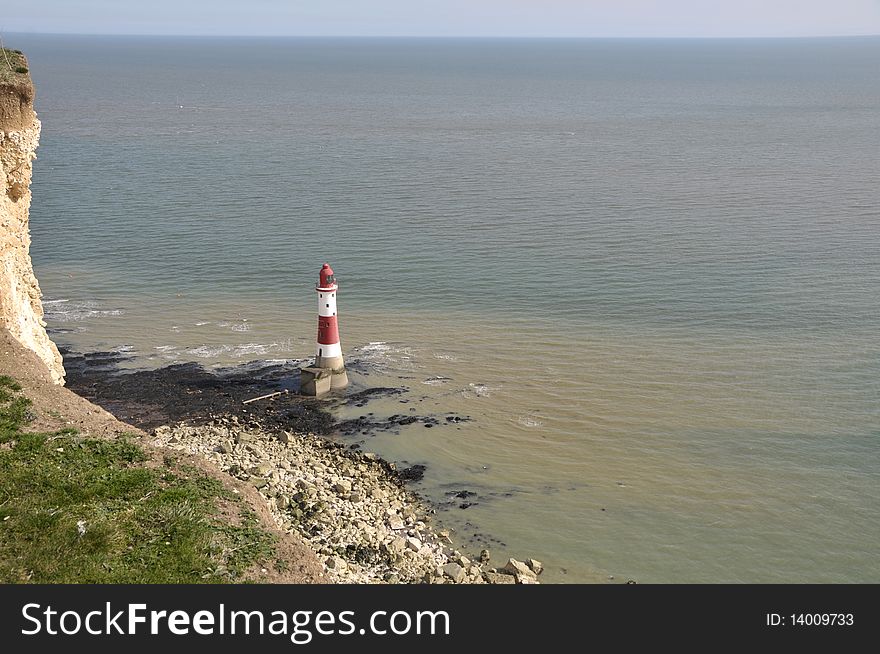 Renowned suicide spot and scenic view, the red and white lighthouse on the Sussex coast near Eastbourne. Renowned suicide spot and scenic view, the red and white lighthouse on the Sussex coast near Eastbourne