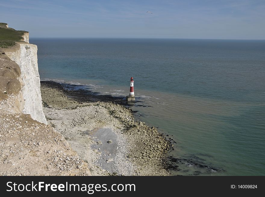 Renowned suicide spot and scenic view, the red and white lighthouse on the Sussex coast near Eastbourne. Renowned suicide spot and scenic view, the red and white lighthouse on the Sussex coast near Eastbourne