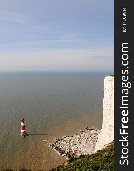 Renowned suicide spot and scenic view, the red and white lighthouse on the Sussex coast near Eastbourne. Renowned suicide spot and scenic view, the red and white lighthouse on the Sussex coast near Eastbourne