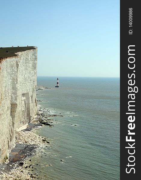 Renowned suicide spot and scenic view, the red and white lighthouse on the Sussex coast near Eastbourne. Renowned suicide spot and scenic view, the red and white lighthouse on the Sussex coast near Eastbourne