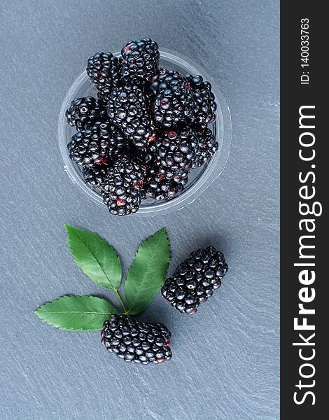 Image of ripe blackberries closeup with leaves. Image of ripe blackberries closeup with leaves