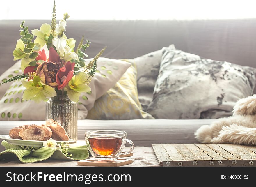 Homely cozy spring interior in the living room