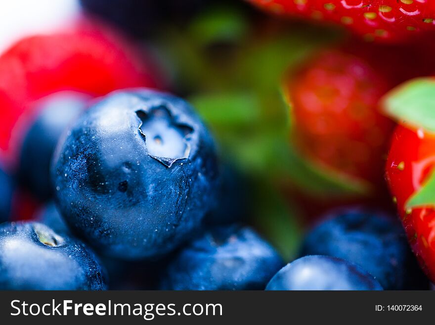 Raspberry Blackberry And Strawberries Served On The Plate. Nature And Food Concept Image With Fresh Fruits On The Plate.