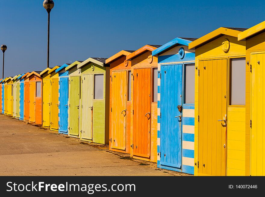 Wooden Public Change Rooms On The Beach. Colorful Change Rooms. Holiday Concept.