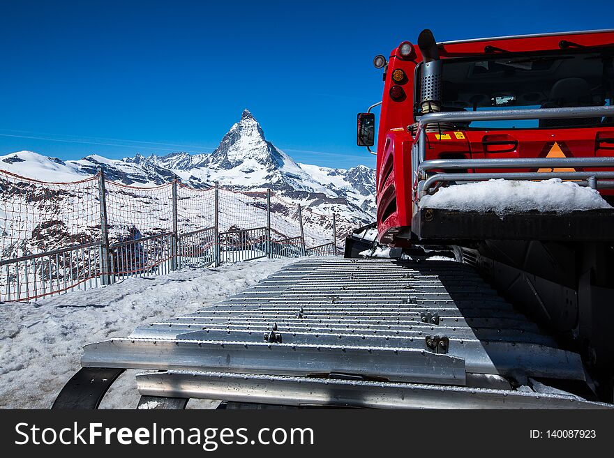 Snow Tractor with Matterhorn in the background - Zermatt, Switzerland. Snow Tractor with Matterhorn in the background - Zermatt, Switzerland