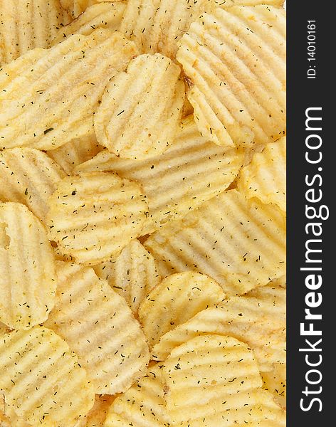 Closeup of ridged potato chips background