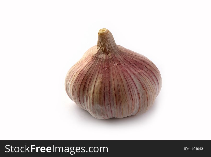 Garlic bulb isolated over white background, closeup.