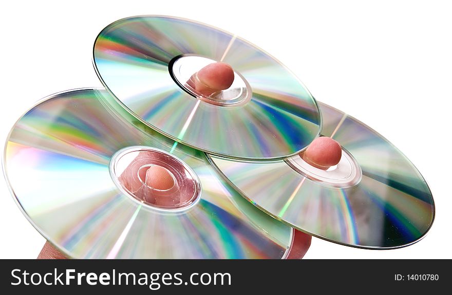 Three dvd disks on hand. Isolated on white background