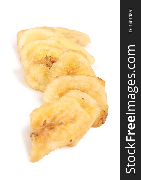 Some sleced dried bananas on white background (isolated)