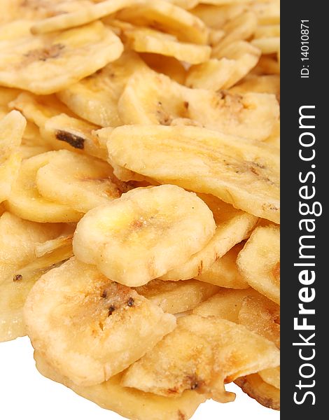 Some sleced dried bananas on white background (isolated)