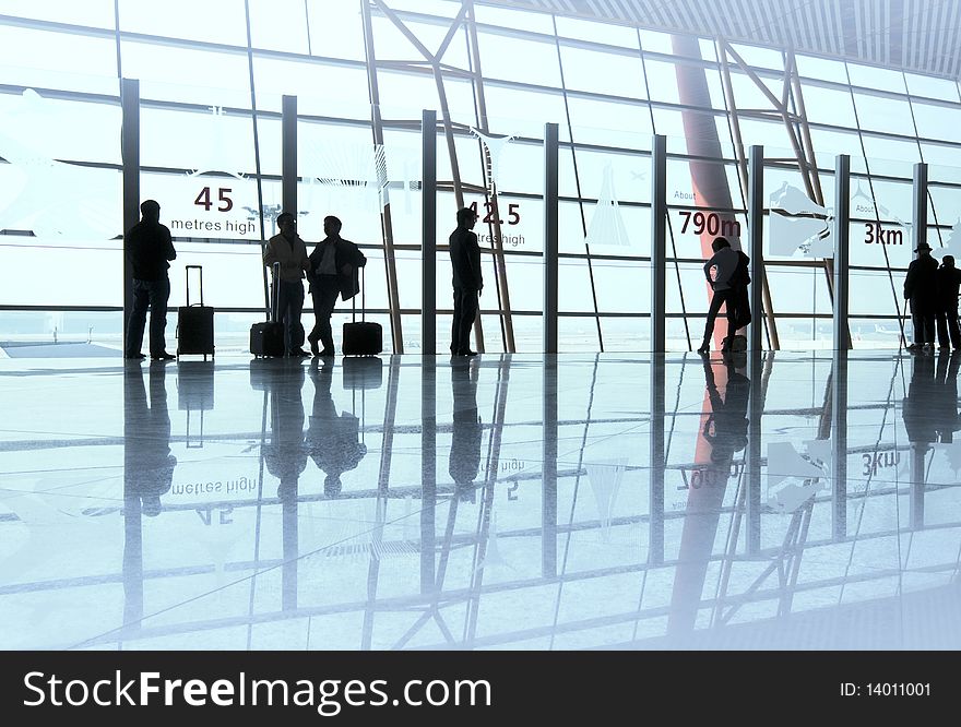 Travelers silhouettes at Beijing airport