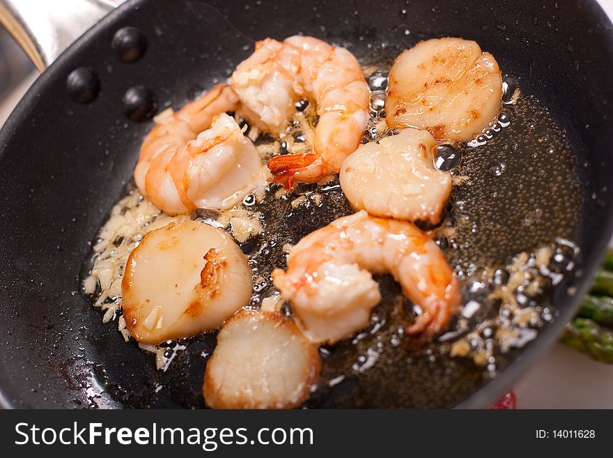 Seafoods on pan, prawn and scallop
