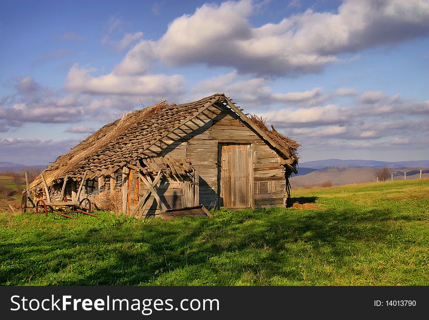 Old abandoned wooden house among the fields. Old abandoned wooden house among the fields.