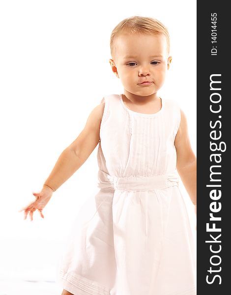 Thoughtful baby girl on white background