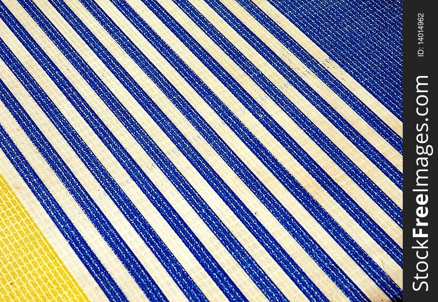 Blue striped plastic surface texture suitable as background