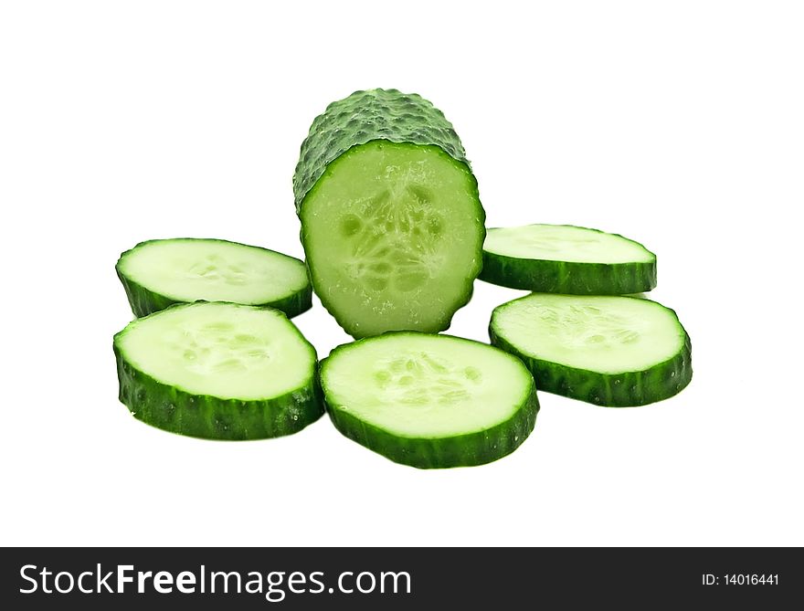 Fresh cucumber with slices isolated on the white